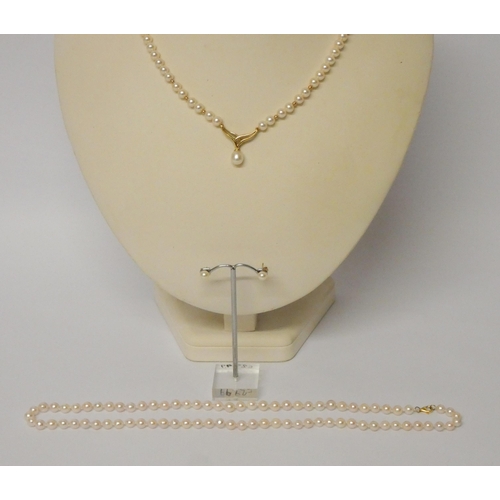 489 - Akoya pearl uniform row on an 18ct gold clasp, a 9ct gold and pearl pendant necklace and a pair of 9... 