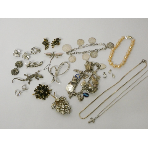 505 - A silver charm bracelet, vintage marcasite brooches, etc and a three penny bit coin set bracelet