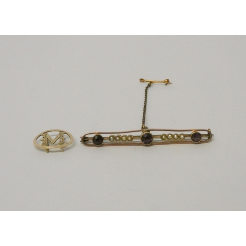 510 - Edwardian 9ct gold seed pearl and amethyst bar brooch and a 9ct gold initial 'M' brooch. 4 grams