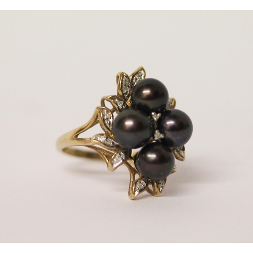 528 - A black cultured pearl and diamond cocktail ring, on hallmarked 9ct gold band, ring size P, gross we... 