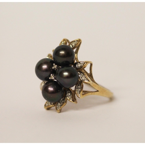 528 - A black cultured pearl and diamond cocktail ring, on hallmarked 9ct gold band, ring size P, gross we... 