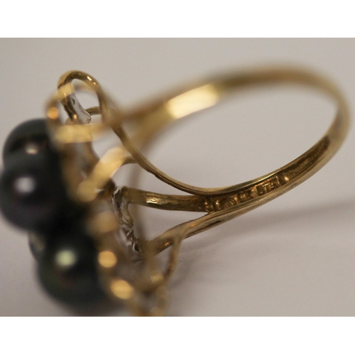 528 - A black cultured pearl and diamond cocktail ring, on hallmarked 9ct gold band, ring size P, gross we... 