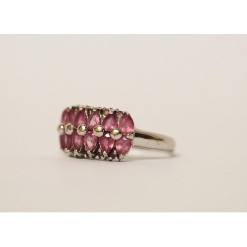 531 - Modern 9ct white gold pink sapphire half hoop ring, hallmarked, ring size N, gross weight 4.1g