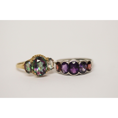 560 - Modern 9ct gold mystic topaz three stone ring and a 9ct white gold five stone garnet and amethyst ri... 