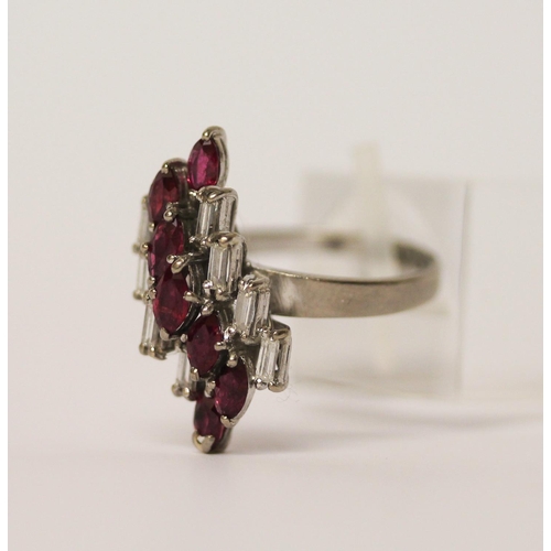 564 - A vintage ruby and diamond cluster cocktail ring, in an offset panel, on 18ct white gold band, marke... 