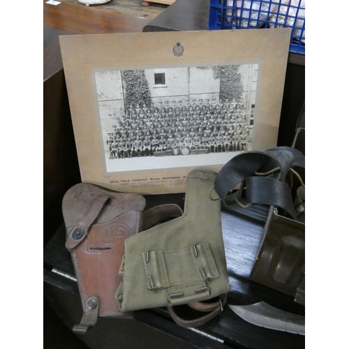 54 - Ammunition box, military badges, leather holsters, knives, photograph etc