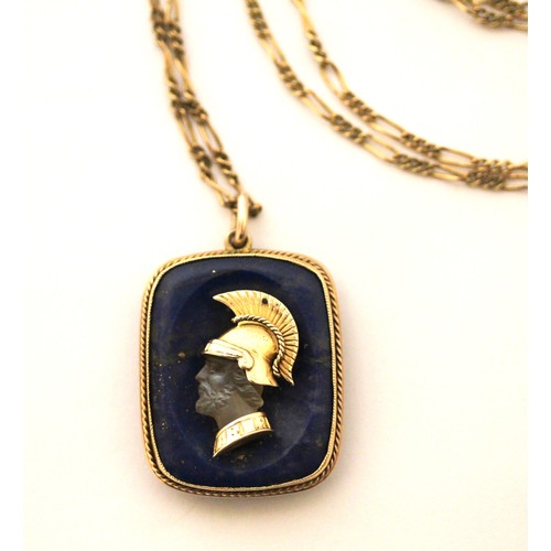 525 - An Etruscan Revival lapis, rock crystal and gold mounted cameo pendant, carved in relief as a Greek ... 