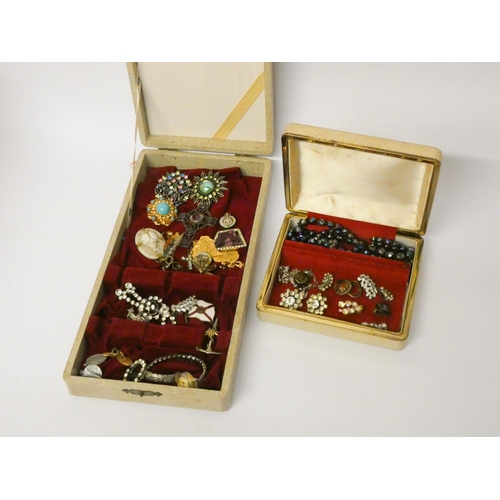 227 - A collection of costume jewellery, brooches etc held within two boxes