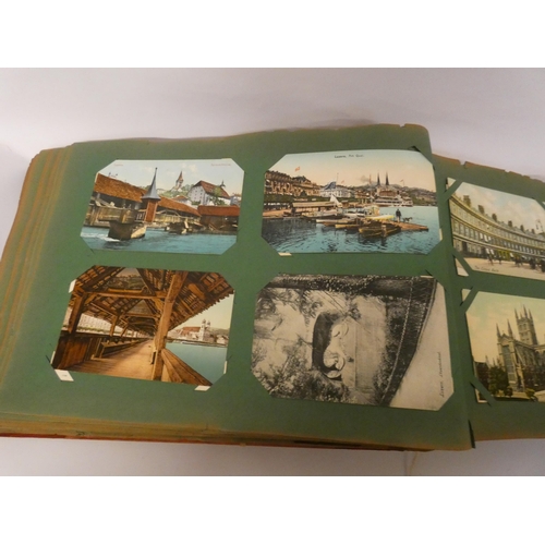 253 - Vintage postcard album and contents of early 20th century souvenir topographical postcards, over 300... 