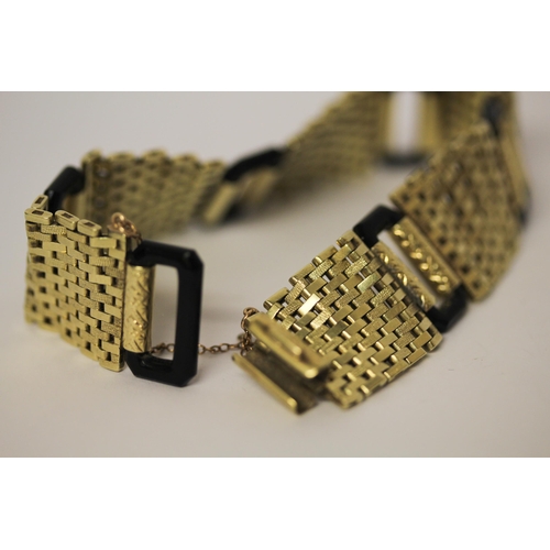 583 - An Art Deco 14ct yellow gold and black onyx link bracelet, invisible clasp & safety chain fitted. Ma... 