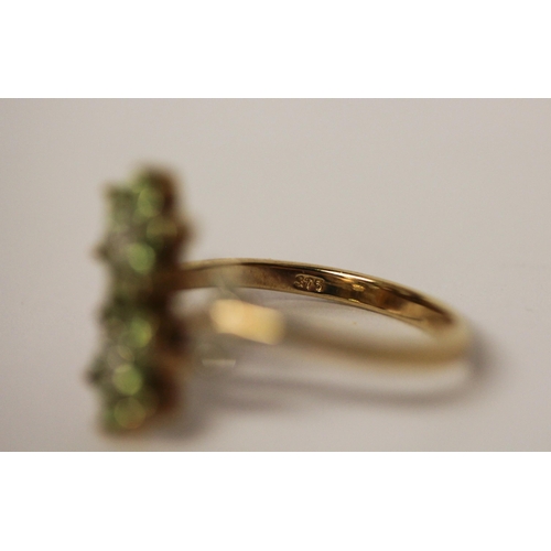 586 - Unusual peridot and diamond double daisy dress ring on hallmarked 9ct gold band. Ring size P, gross ... 