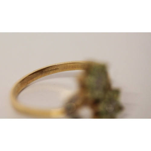 586 - Unusual peridot and diamond double daisy dress ring on hallmarked 9ct gold band. Ring size P, gross ... 