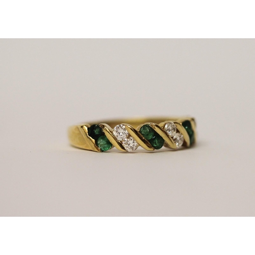 587 - 18ct yellow gold emerald and diamond half hoop eternity ring, hallmarked, ring size M, gross weight ... 