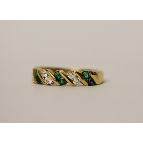 587 - 18ct yellow gold emerald and diamond half hoop eternity ring, hallmarked, ring size M, gross weight ... 