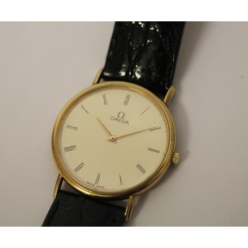 604 - Gents 18ct gold Omega dress watch on black strap