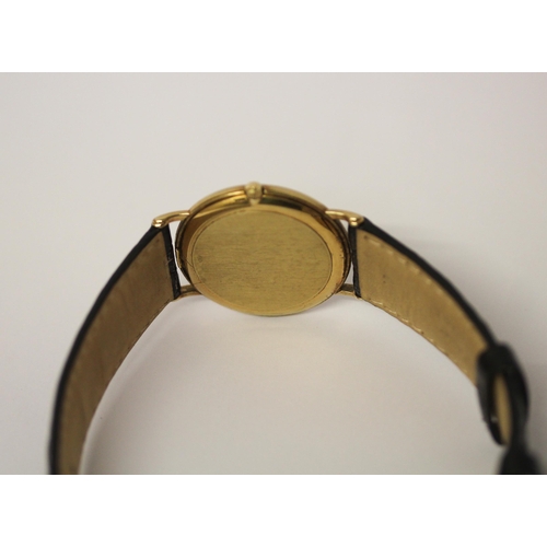 604 - Gents 18ct gold Omega dress watch on black strap