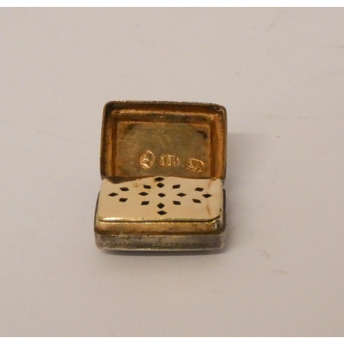 616 - A Georgian miniature silver vinaigrette, gilded interior, lid marked IB, 19mm across