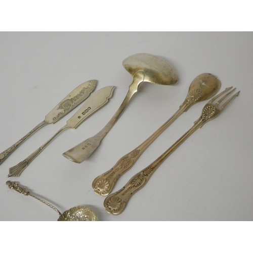 618 - A silver pickle fork and spoon, sauce ladle, sifting spoon and two butter spoons, 5.45 troy oz