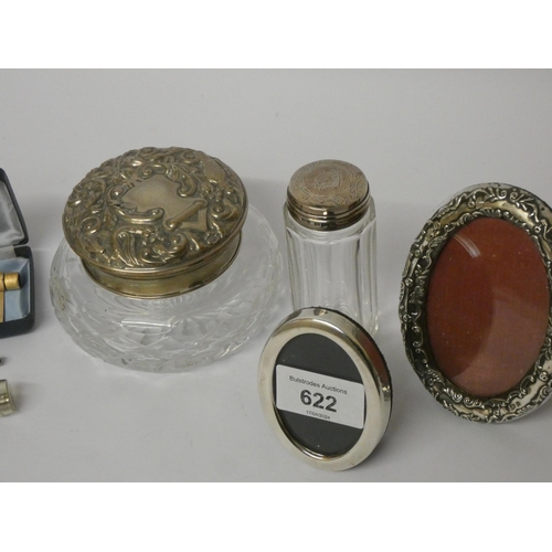 622 - Two silver topped dressing table jars, two oval silver photograph frames, and a Sheaffer gold plated... 