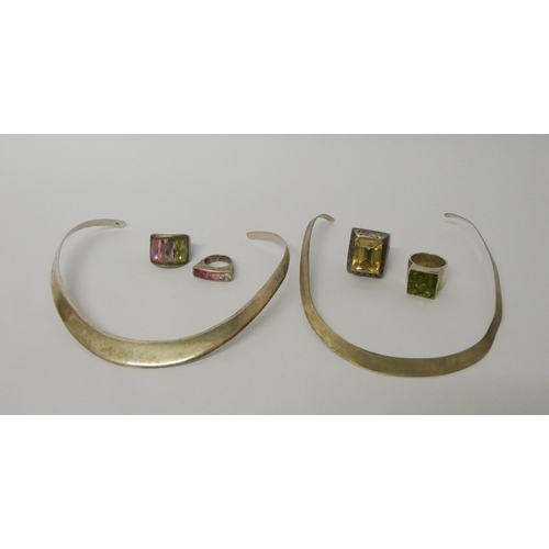 624 - Four large modern silver stone set statement dress rings and two silver collar necklaces. All marked... 