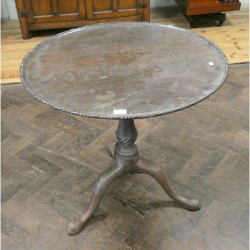 177 - An antique mahogany circular tripod table, top 30