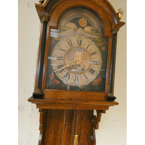 189 - A large 20th century Dutch oak wall clock with brass weights