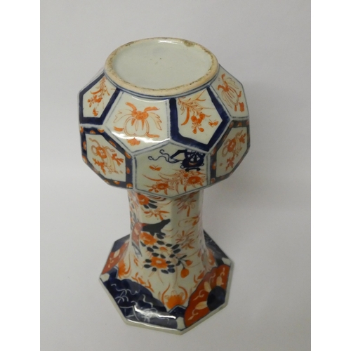 243 - A large Imari octagonal bodied flared rim vase