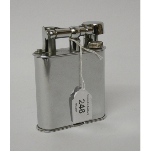 246 - Dunhill swing arm lighter, chrome plated table size model, engraved inscription. Patent Number 14375... 