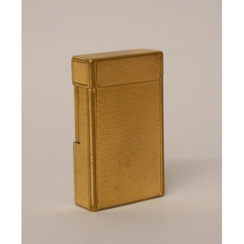 248 - Dupont gold plated lighter with engine turned decoration.