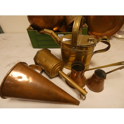 392 - A collection of copper and brass trays, brass jug, comport and a bed warming pan