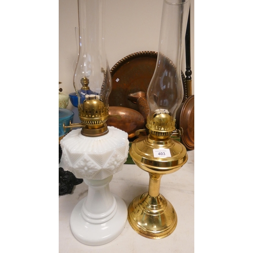 403 - A milk glass Victorian oil lamp and a brass oil lamp