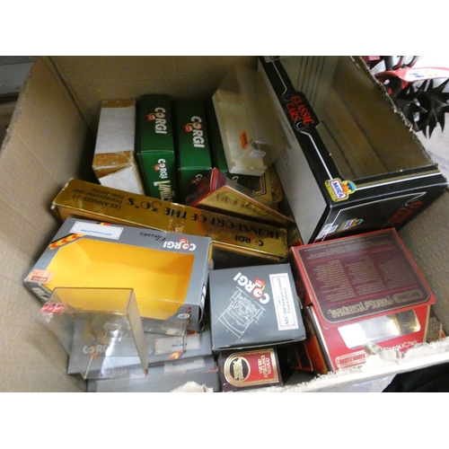 213 - A large box of played with model cars, buses and other die cast model vehicles and a large box of em... 