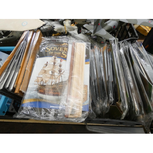 312 - Three large boxes of airplane magazines, airplane figures and models, boat magazines etc