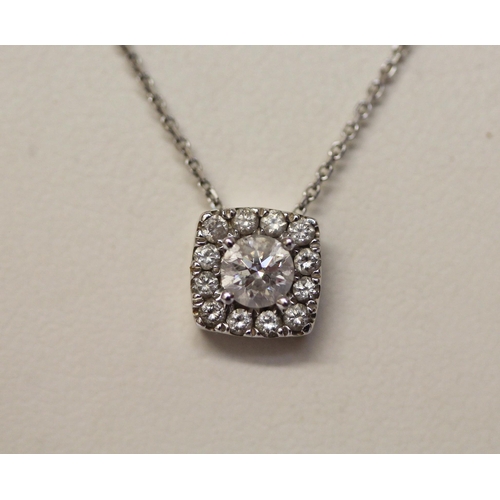 513 - A modern diamond set pendant, of square form, total diamond weight 0.4 carats, in 9ct white gold, gr... 