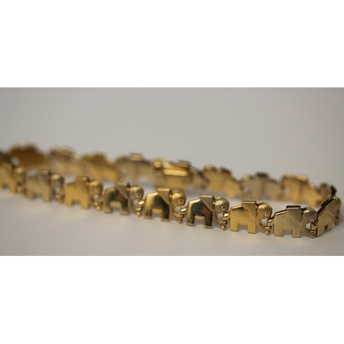 536 - An elephant design bi-colour 18ct gold bracelet, clasp marked 18ct, 20 cms long, 11.5g