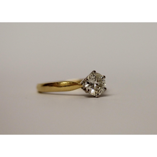 537 - A diamond engagement ring, the solitaire brilliant cut diamond in claw setting, diamond weight .86 c... 