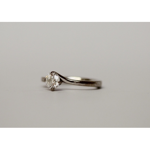 557 - A solitaire diamond ring - the brilliant cut diamond weighing 0.6 carat, colour F, Si1, with GIA cer... 