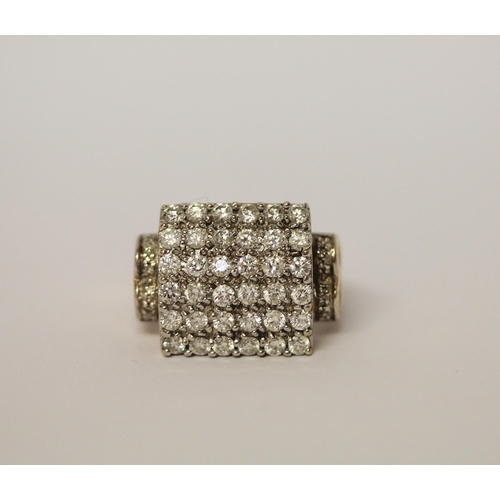 566 - A large square diamond panel ring, pave set with brilliant cut diamonds, on 9ct gold band. Marked 37... 