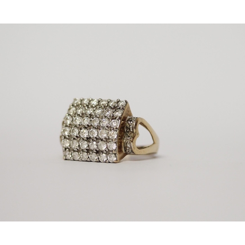 566 - A large square diamond panel ring, pave set with brilliant cut diamonds, on 9ct gold band. Marked 37... 