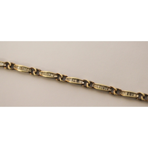 574 - 9ct yellow gold diamond bracelet, the oval links with one carat of diamonds, gross weight 5.3g with ... 