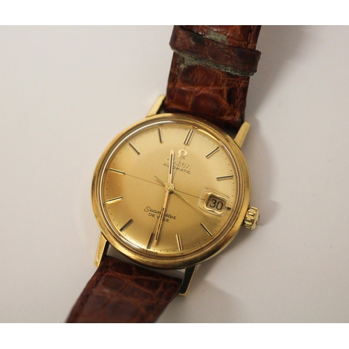 609 - Omega - Vintage Seamaster DeVille Automatic 9ct gold wristwatch, on brown leather strap, with box