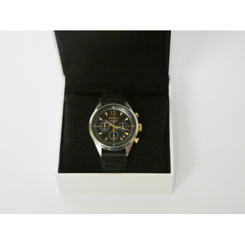 613 - Seiko Chronograph 100m stainless steel wristwatch, on fabric strap, boxed.