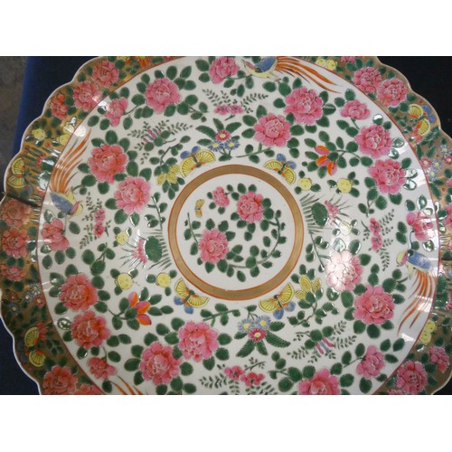 295 - A large circular Famille Rose porcelain charger, 18