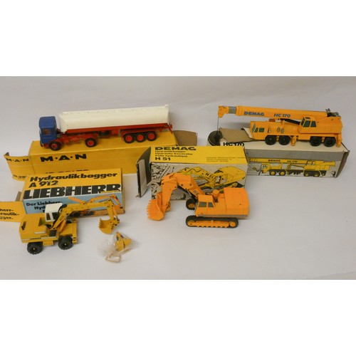 338 - Nine boxed model lorries, tractors, JCB's etc (see condition report for models) - boxes as found