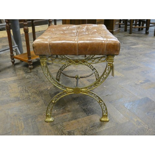 294 - A brass X framed stool with antique brown  leather buttoned top