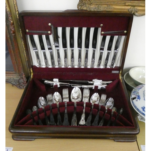 15 - A canteen of Kings pattern cutlery in mahogany case...