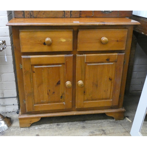 47 - A small pine sideboard fitted drawers and cupboards, 3' wide...