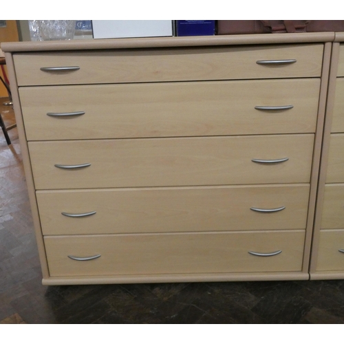 5 - A modern light beech finished chest of five long drawers with stainless steel handles, 37