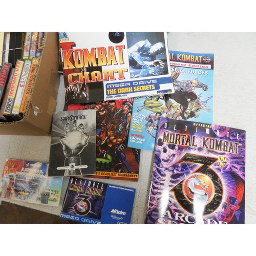 416 - A quantity of Spectrum, Game Boy, Mega CD's, games etc, magazines and a plug in gun...