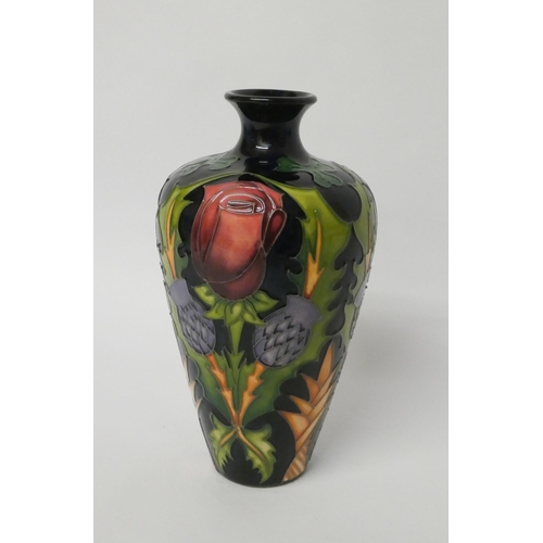 202 - A  Moorcroft vase decorated with Rose, Thistle & Shamrock pattern, emblems of the British Isles, des... 